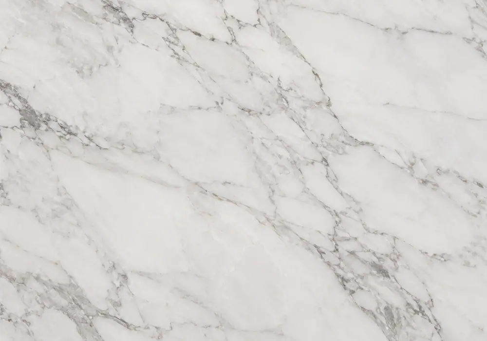 Lumix backlit wall through milky crystalline stone with clouded bands, plus polished vanity and subtle honed floor detail.