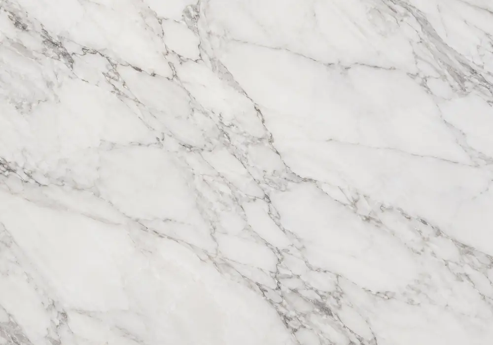Luminous milky-white Makrana Marble features subtle grey movement and pearly crystal depth from its Makrana Rajasthan origin.