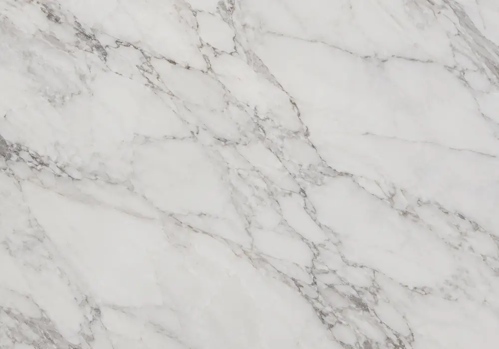 Maroon Marble fireplace surround in a luxury stone showroom with upright slabs and refined wall finishes