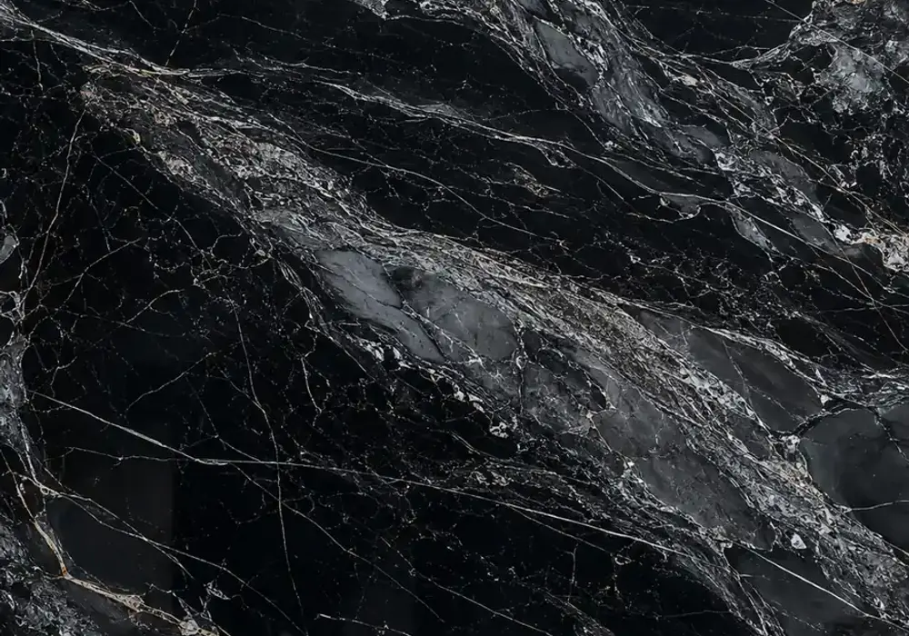 Mercury Black vs Nero Marquina on flooring, countertop and pool surround, comparing flowing silver veins with pale fractures.