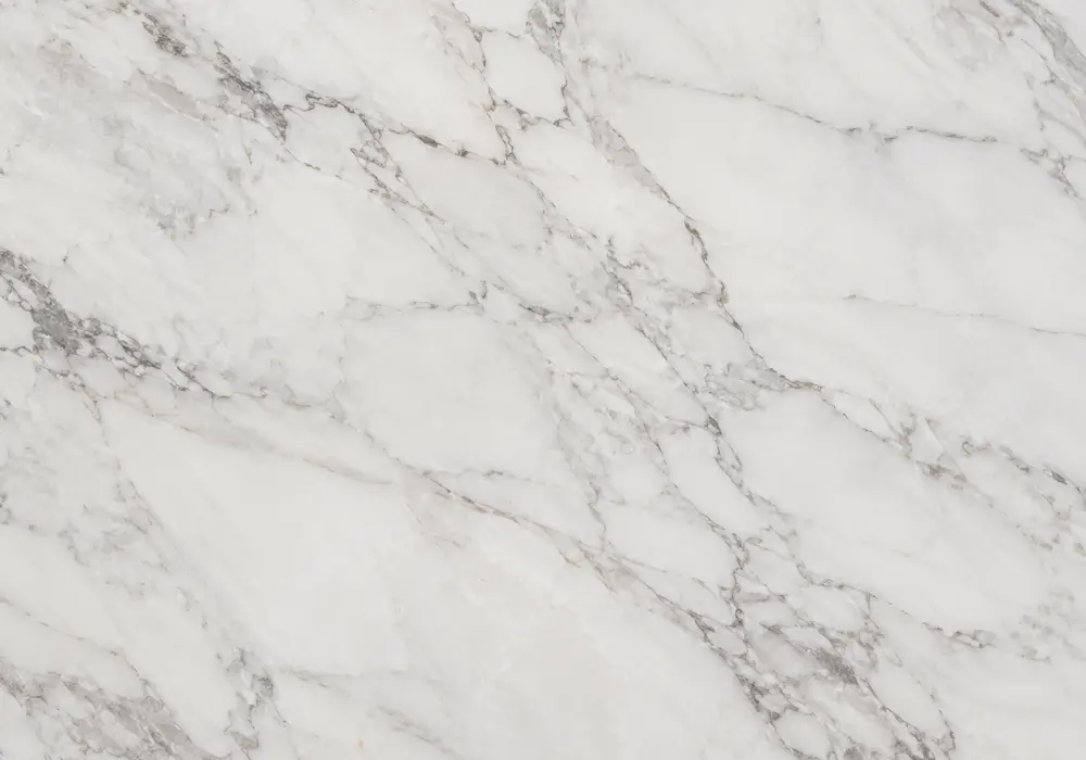 morchana marble slab in a residential foyer, showing natural veining, polished stone depth and refined architectural detail.