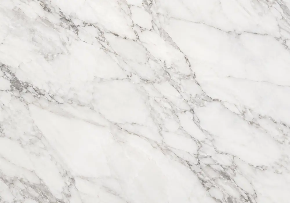 Luminous Morwad White marble slab with milky-white depth, delicate grey-beige lines, warm clouds and crystalline mottling.