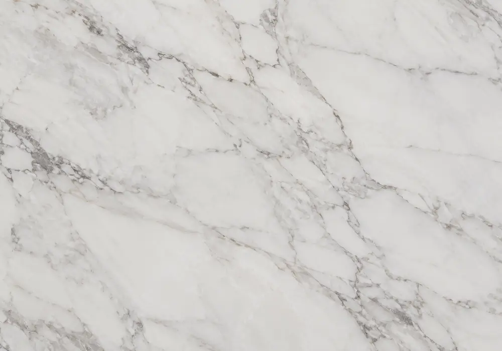 Namibia White UAE in a luxury kitchen, showing realistic stone texture, polished depth and refined architectural character.