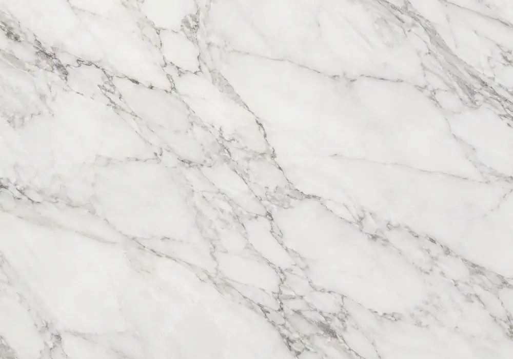 Nestos Beige tile featured in a contemporary hotel lobby, showing authentic stone texture and refined architectural detail.