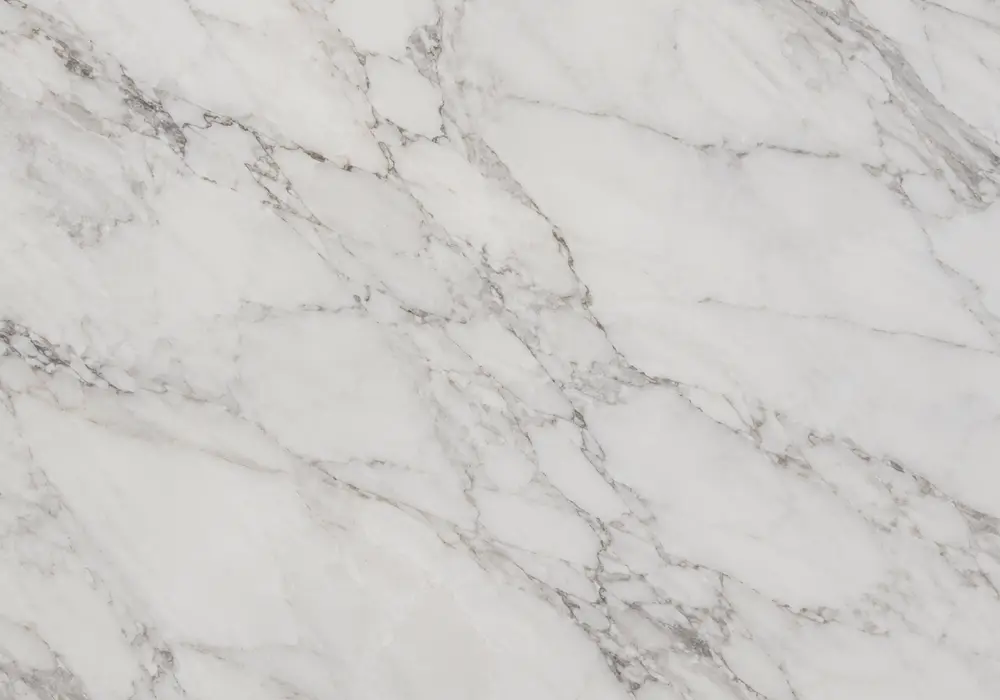 Nestos flooring in vein-aligned honed panels with bathroom surfaces and exterior sample, showing straight grey-brown lines.