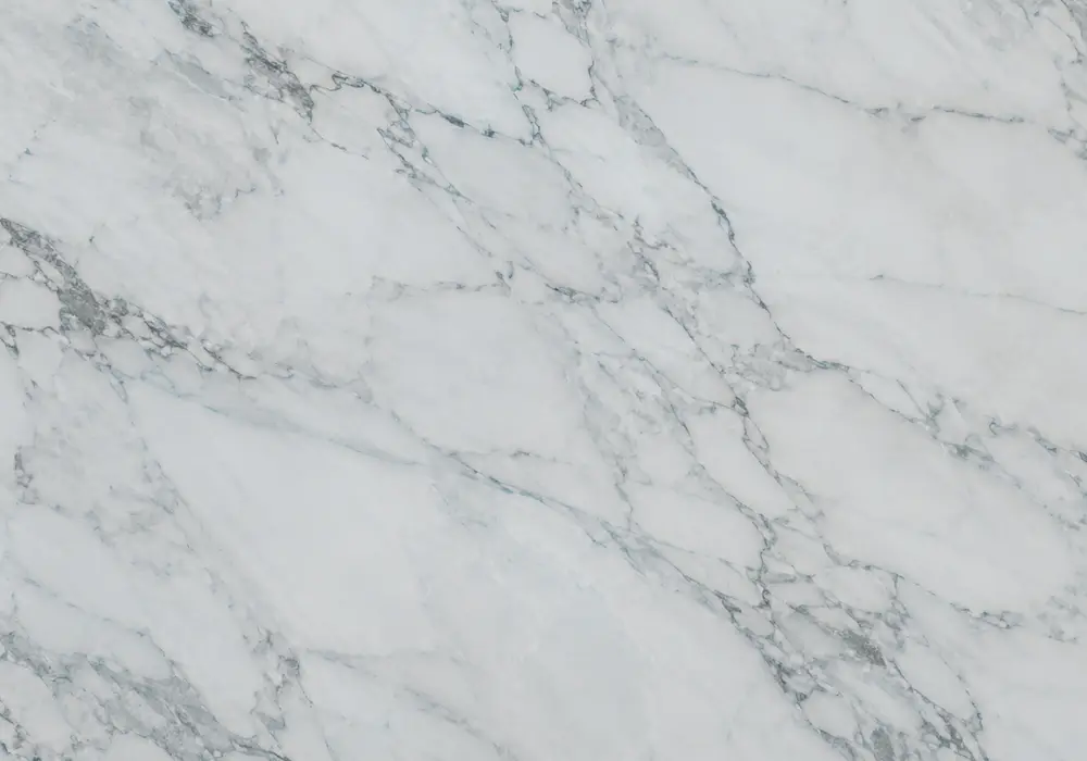 Ocean Blue marble fireplace surround with blue, silver-grey and black stone showing dramatic flowing movement.
