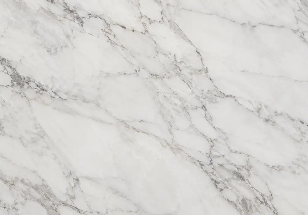 Ocean Marble slabs used on a polished feature wall and kitchen surface with honed floor, stairs and bathroom vanity panel.