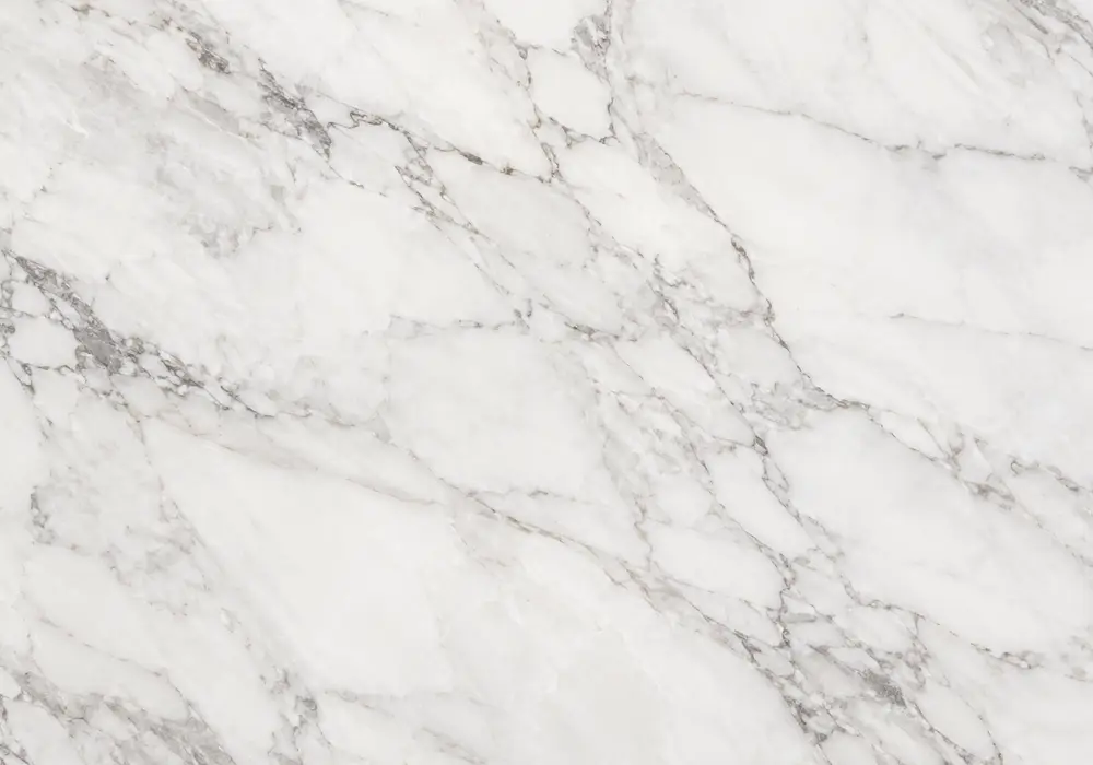 Off white marble refined fireplace surround with soft ivory stone, subtle warm veining and understated mineral detail.
