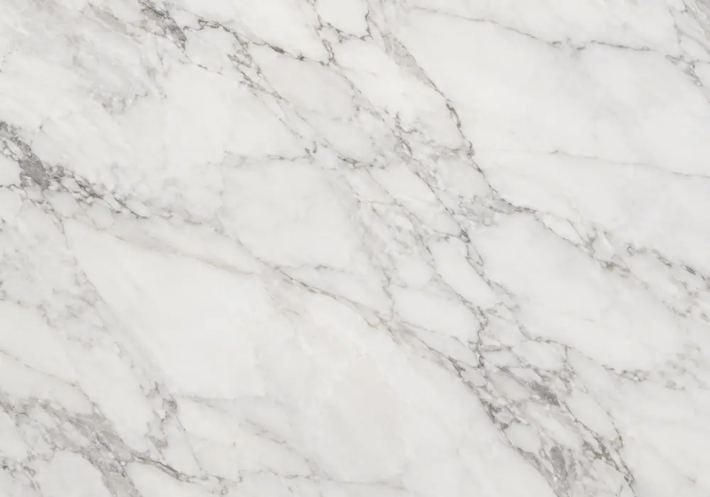 Warm off white marble types slab with pale ivory depth, faint taupe threads, beige patches and subtle crystalline grain.