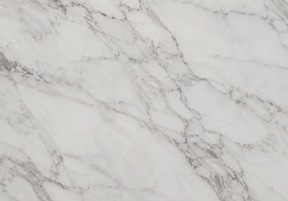 Olympia White marble price featured in a luxury bathroom, showing authentic stone texture and refined architectural detail.