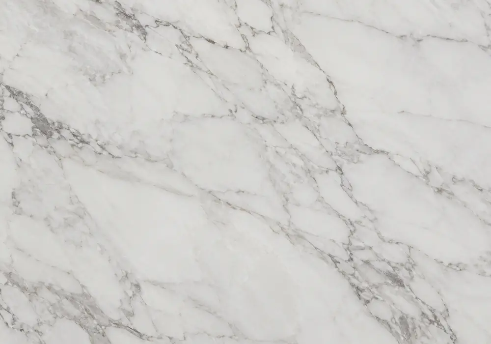 Sohar Beige selection in a Gulf villa foyer, showing natural mineral movement, realistic finishes and architectural detail.
