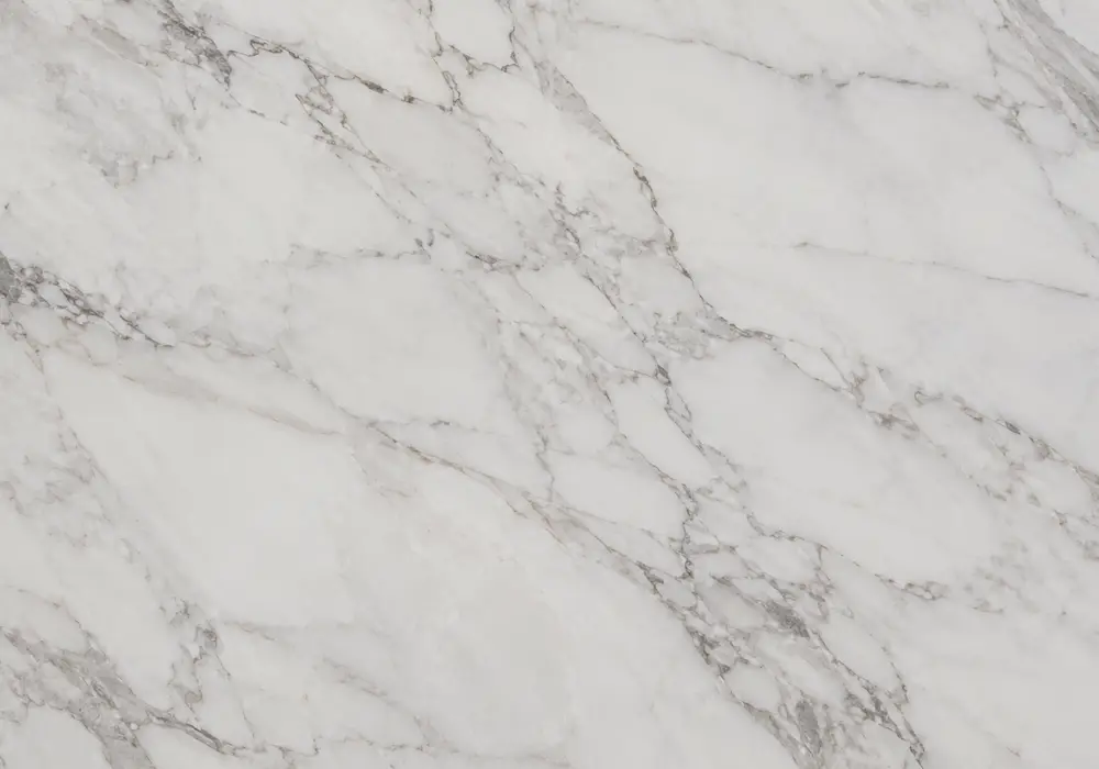 Orange Marble showcased in a premium stone gallery with upright slabs, finish samples and refined interiors