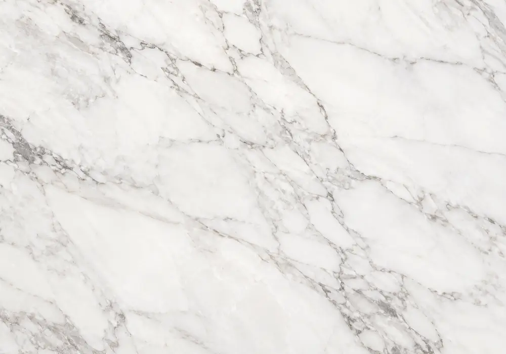 gold and white wave veining flows across a polished feature wall and counter with honed sample and sheltered exterior panel.