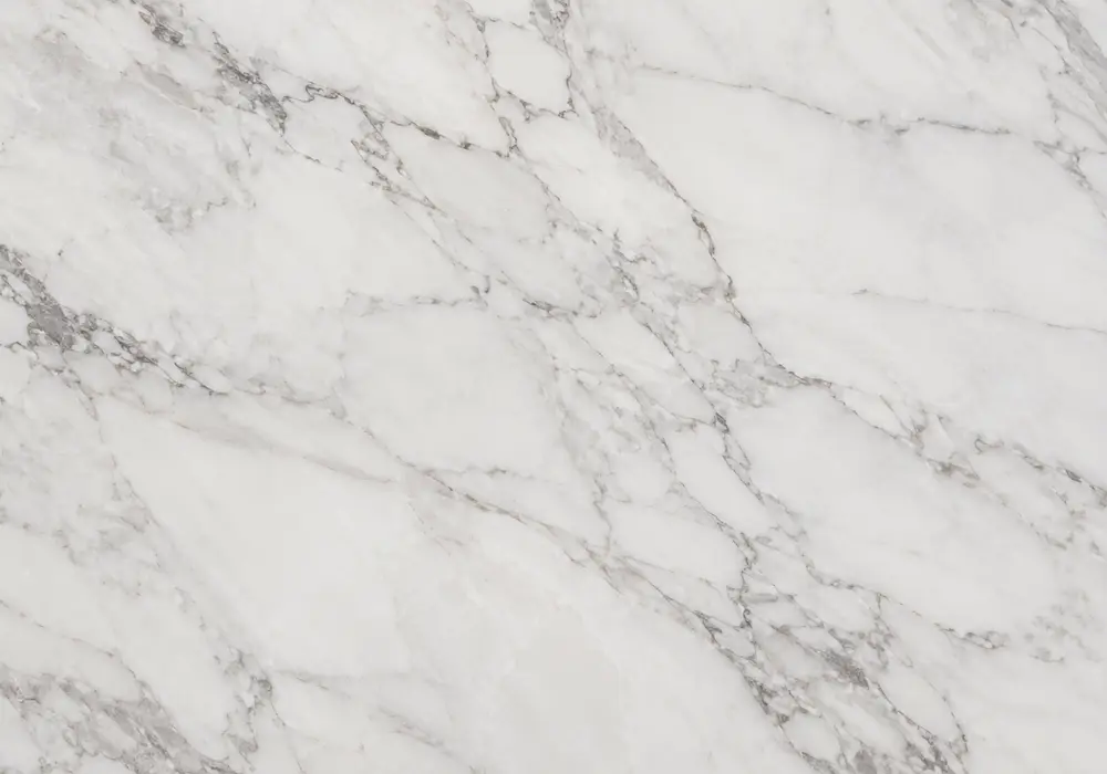 Orobico Grigio Rosa in a luxury hotel lobby, showing authentic veining, realistic finishes and soft architectural lighting.