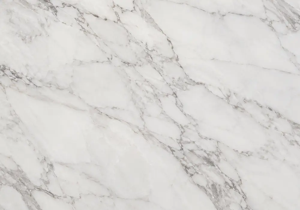 Folded grey, gold and amber bands sweep through Orobico Marble, reflecting the layered depth of Orobic Alps marble origin.