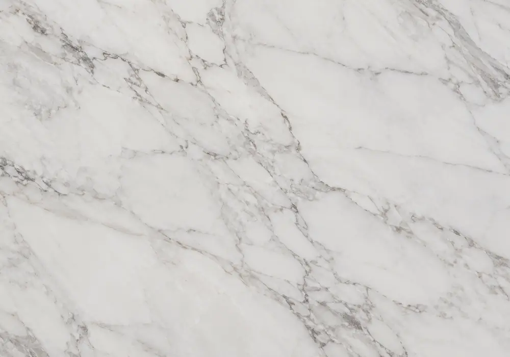 oyster white kitchen in a luxury kitchen, showing natural veining, polished stone depth and refined architectural detail.