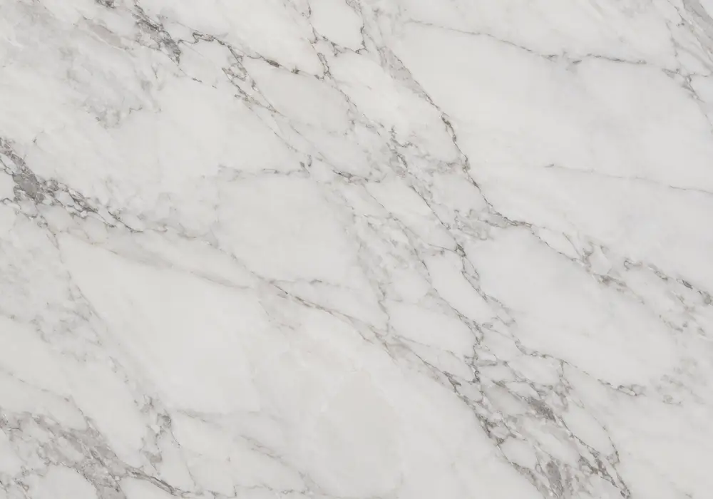 Panda Marble dining tabletop displayed in a premium showroom with full slabs and elegant stone applications