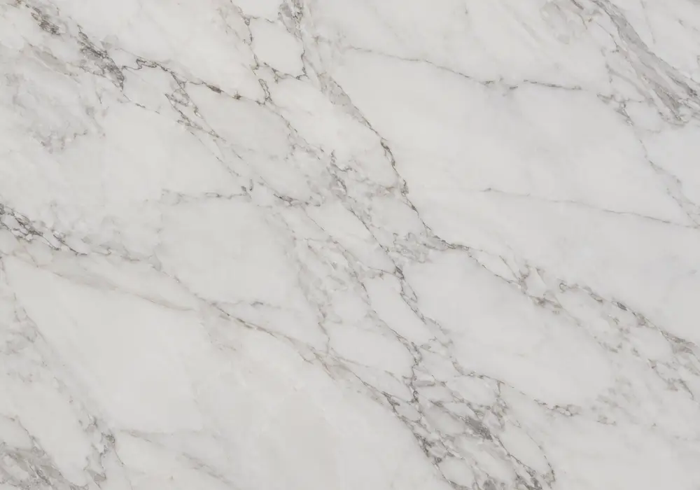 Pentelikon marble classical fireplace surround with luminous white stone and subtle pale-gold mineral threads