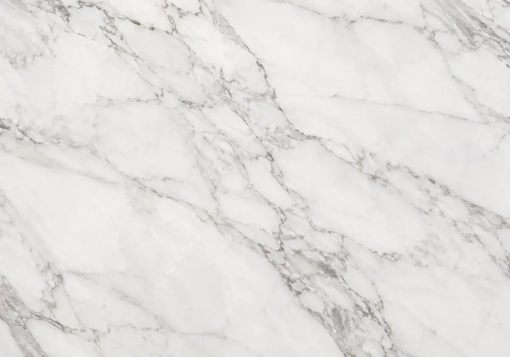 Perlatino Sicilia used in a hotel lobby, showing authentic veining, polished stone depth and refined architectural detail.