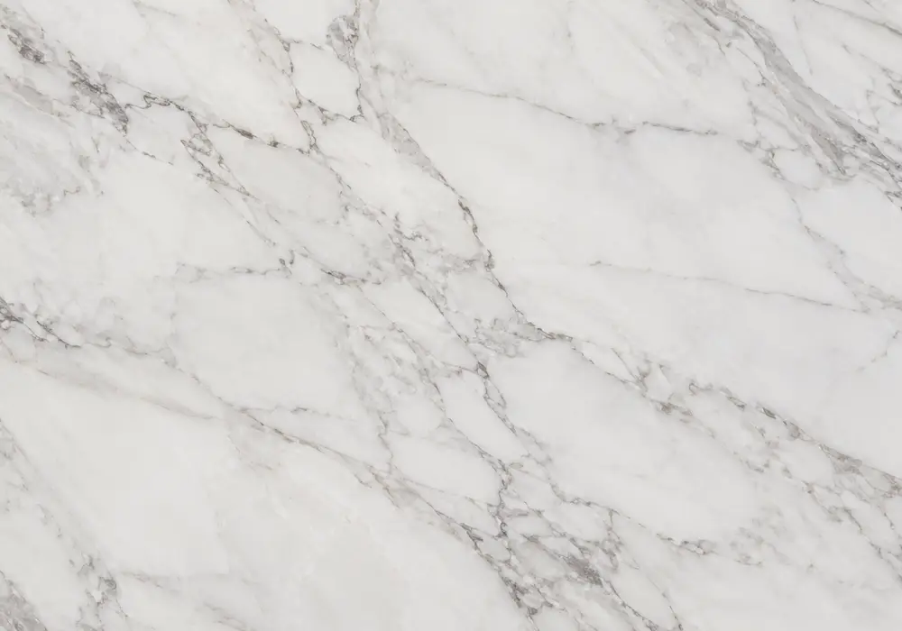 pietrasanta porcelain slab in a high-end bathroom, showing natural veining, polished depth and refined architectural detail.