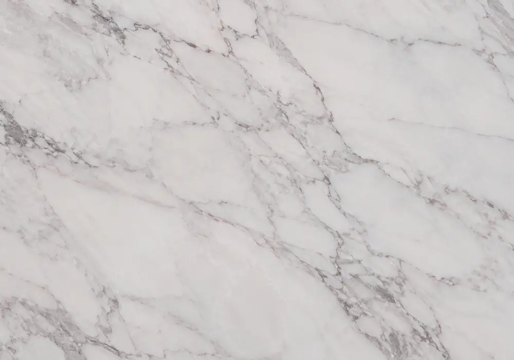 peach pink stone in a luxury powder room, showing authentic veining, refined stone texture and soft architectural lighting.