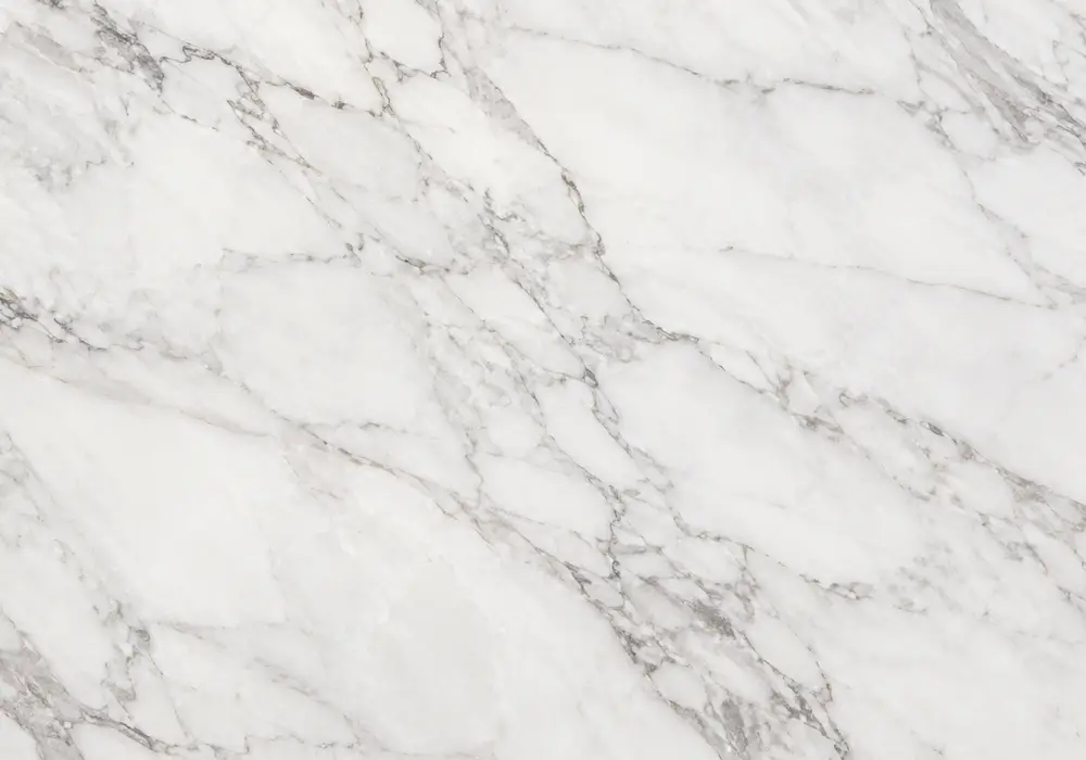 Radiant Greek Polaris marble slab with snow-white crystal grain, rhythmic silver-grey threads and delicate taupe veining.