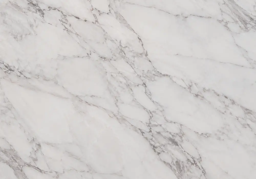 Rosso Lepanto marble in a hotel lounge, showing natural veining, realistic stone depth and refined architectural detail.