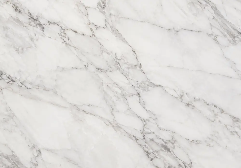 Italian Liguria Levanto in a sophisticated lounge, with natural slab variation, polished surfaces and architectural detail.