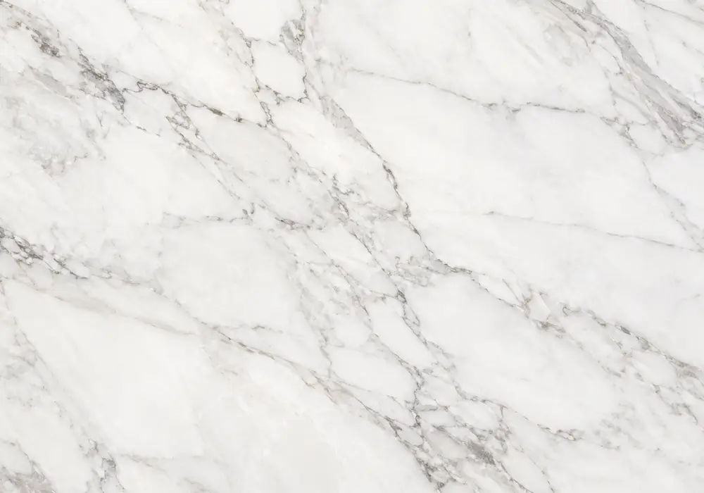 Blush, salmon and rose tones with cream and burgundy veins showcase the rich diversity of natural pink marble varieties.