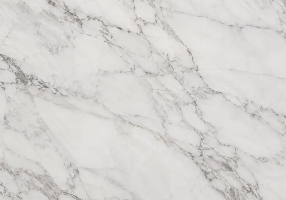 Estremoz pink marble showcased in an elegant powder room, with natural veining, polished depth and refined interior detail.