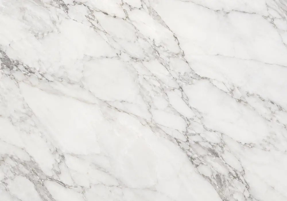 rosso alicante vs rosso levanto in a Mediterranean luxury foyer, showing natural veining and refined architectural detail.
