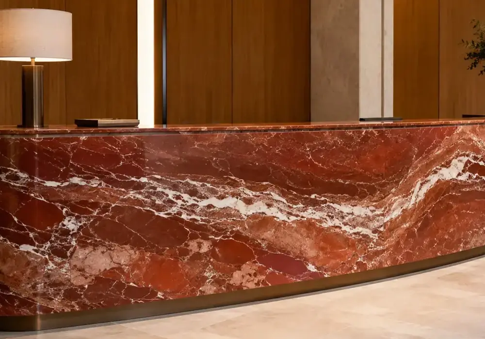 Rosso Francia price featured in a classical luxury foyer, showing authentic stone texture and refined architectural detail.