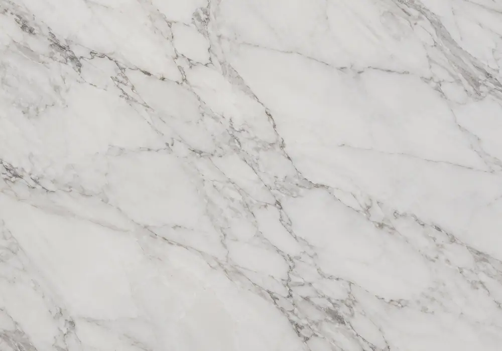 red marble countertop on polished island and reception counter with deep red stone, cream veins and broad mineral movement.