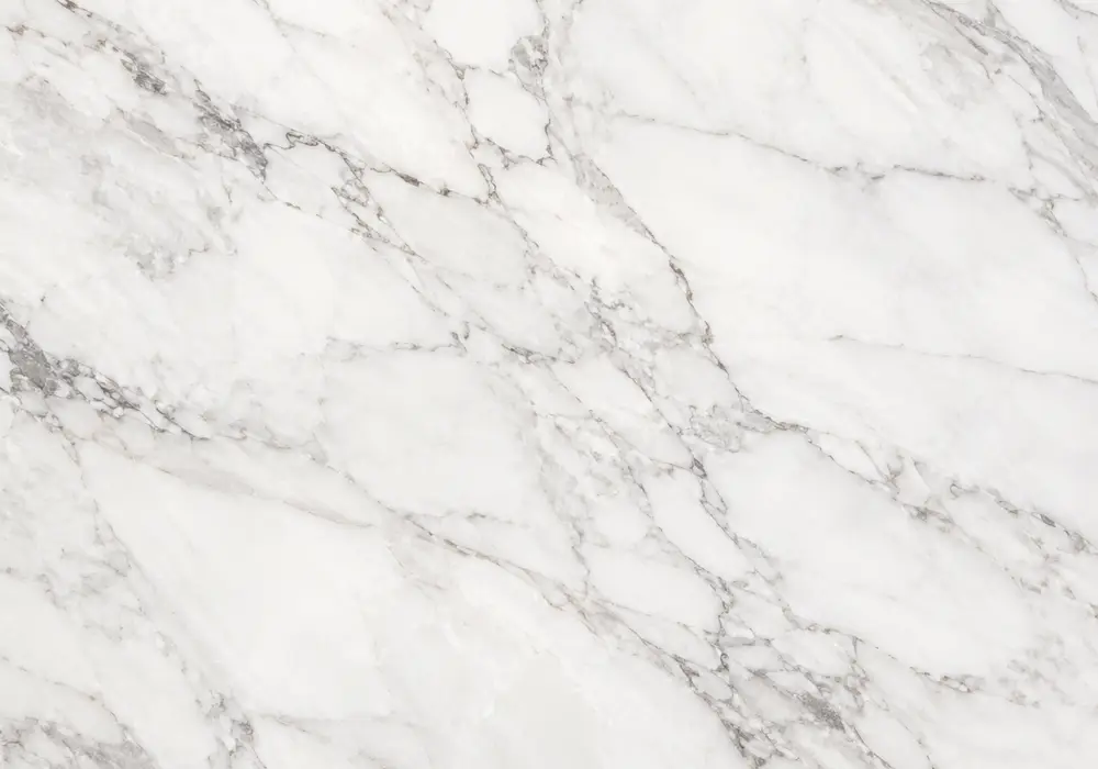 Rosso Lepanto vs Rosso Levanto in a sophisticated lounge, showing natural stone texture and refined architectural detail.