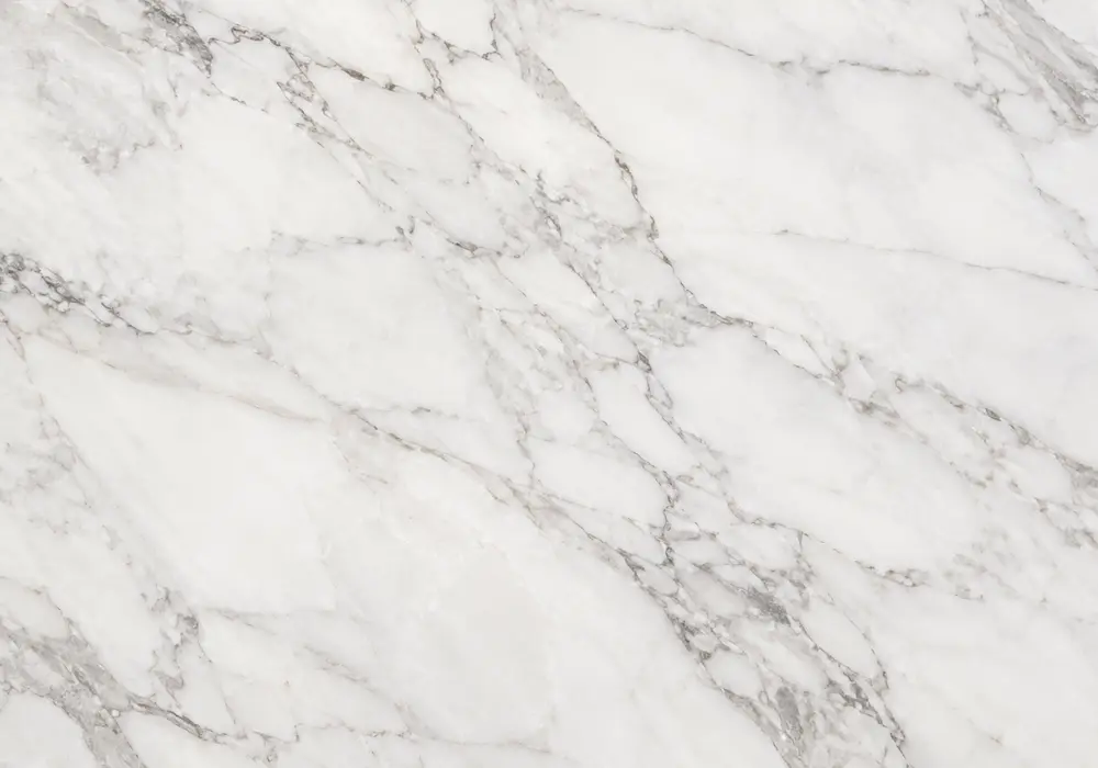 Rosso marble slabs in crimson, burgundy and terracotta tones with polished and honed samples, tiles and fabrication pieces.