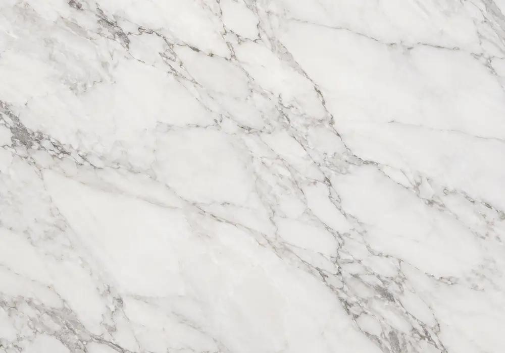 Rosy rosso venato marble slab with muted burgundy depth, pale mineral bands, white speckles and concentrated grey movement.