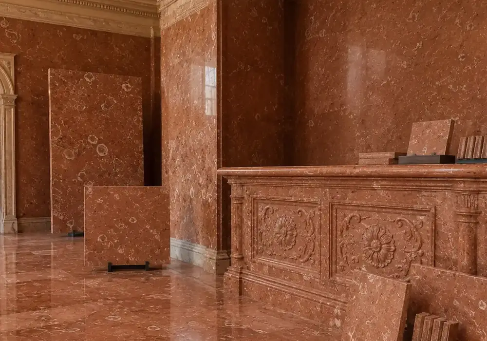 sophisticated historical feature stone used across terrace flooring and a stone countertop, with authentic slab variation.