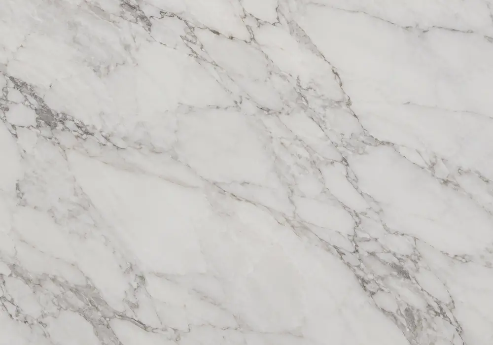 Royal Fancy marble bookmatched feature wall displaying refined natural slab variation in a luxury stone gallery.