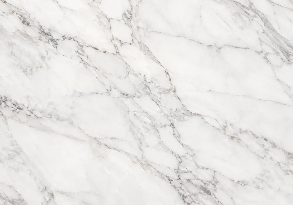 Botticino Royal Fancy marble slab: cream and brown, clouded movement and fine stone grain, with clear geological character.