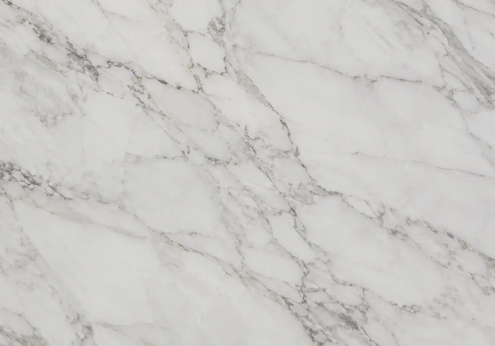 Sahara Beige marble price image: beige, cream and brown, clouded movement and mineral patches, and subtle natural fissures.