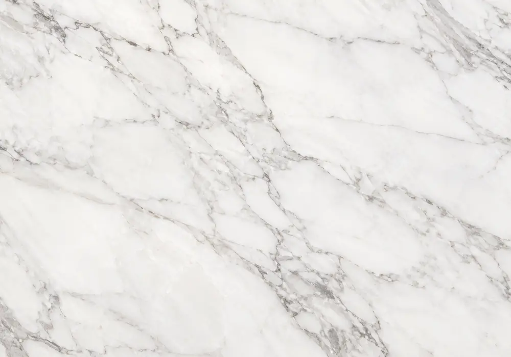 Bold Nero Sahara marble slab with a deep black field crossed by white, bronze, gold and ochre linear veining and fine grain.