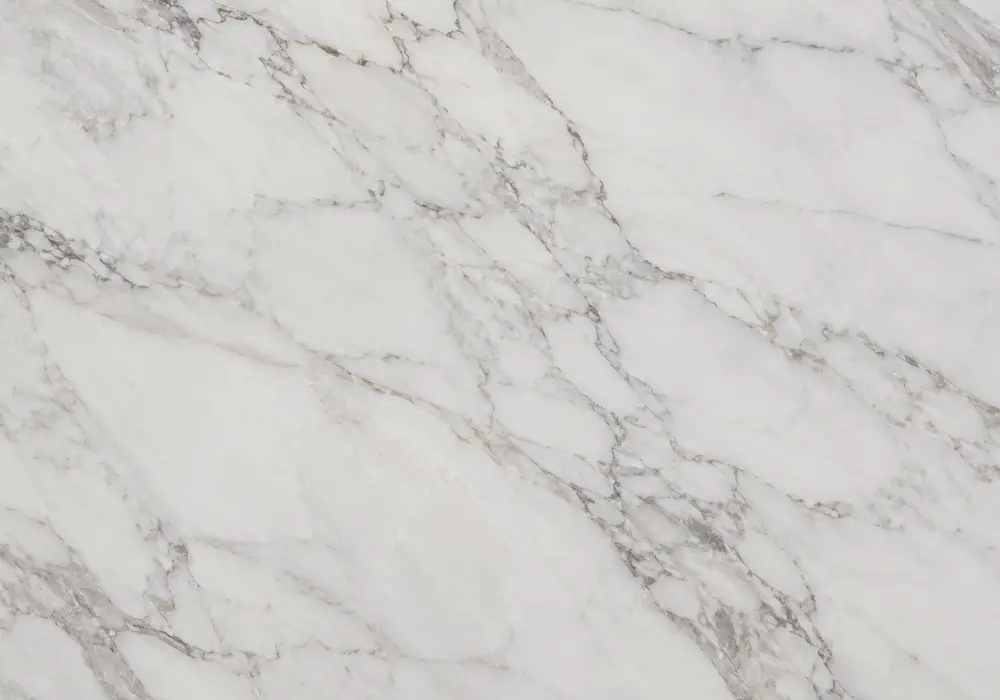 Silk Georgette marble linear lobby wall with soft white-grey stone and elegant directional wood-grain veining.