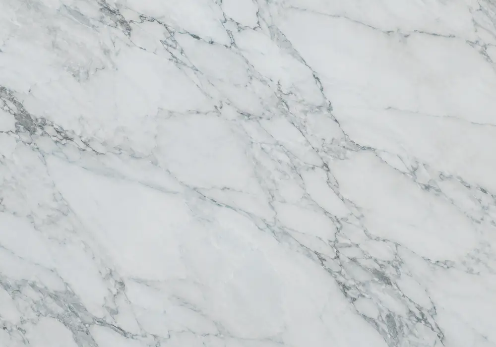 Silver Blue Marble dining tabletop in a luxury stone gallery with upright slabs and refined architectural finishes