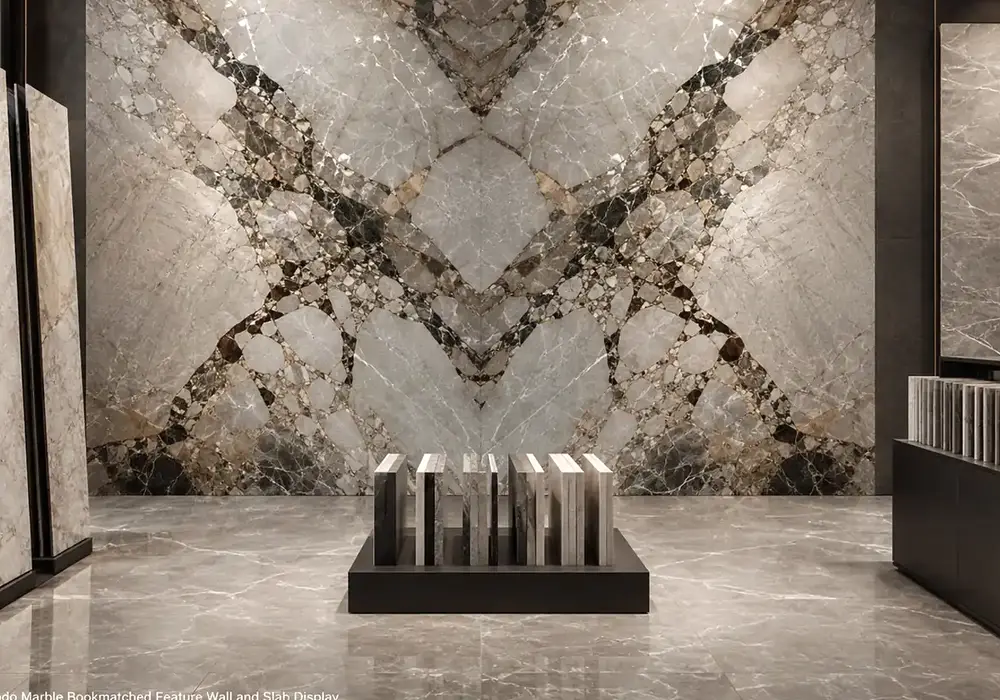 Silver Eldorado marble contemporary foyer wall with silver-grey stone and expressive darker linear movement.