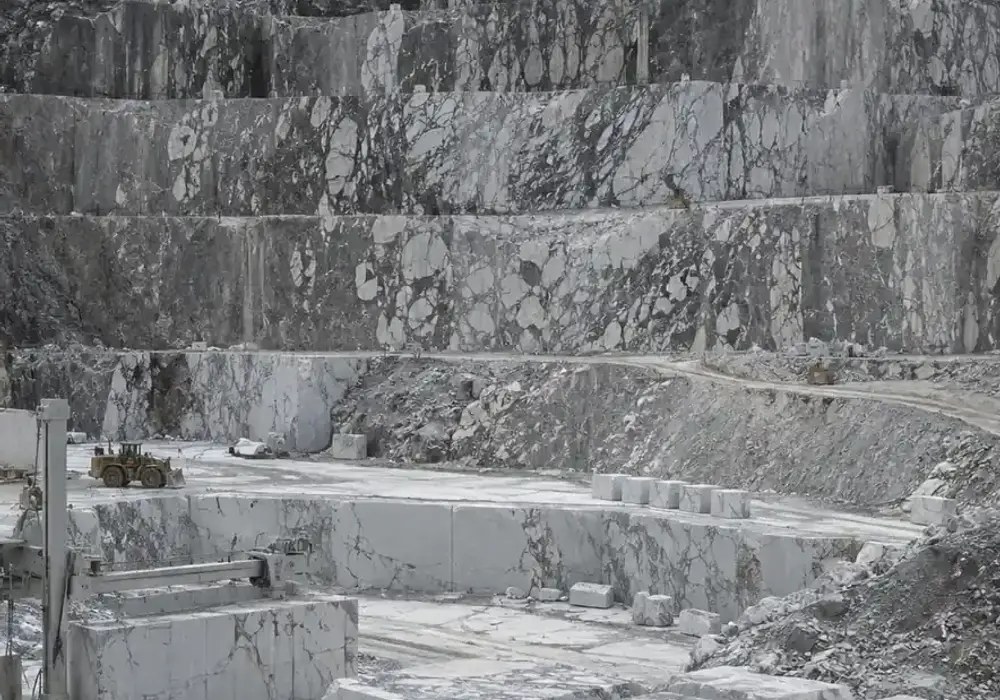 cloudy silver marble slabs in ash and cool-grey grades shown polished, honed, leathered and brushed with UAE project stock