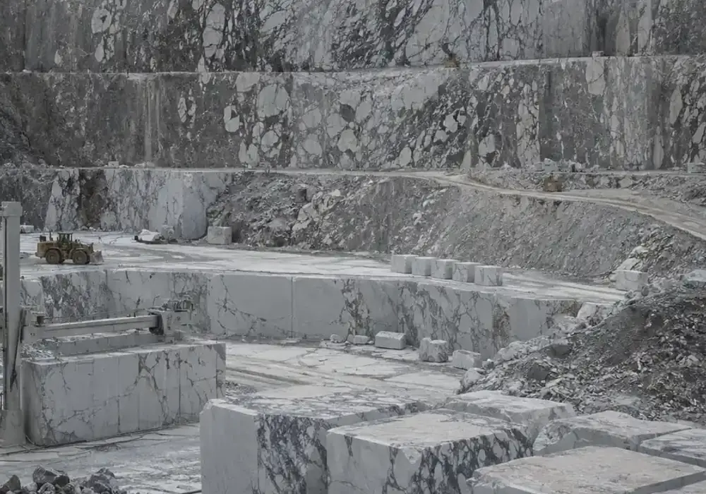 Greek Grey marble used in a spa bathroom, showing natural veining, realistic stone depth and refined architectural detail.