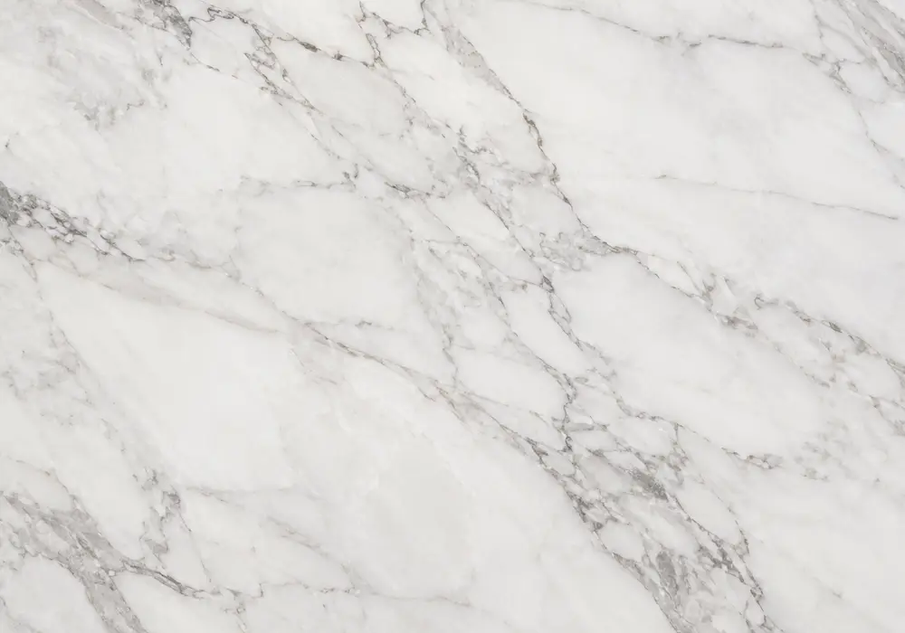 Cyprus Silver stone shown in polished, honed and leathered slabs with tiles and a safe slip-conscious wet-area floor sample.