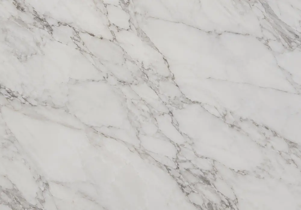 Flowing Silver Waves marble slab with dark charcoal depth, luminous silver-white bands, beige-gold accents and fine fissures.