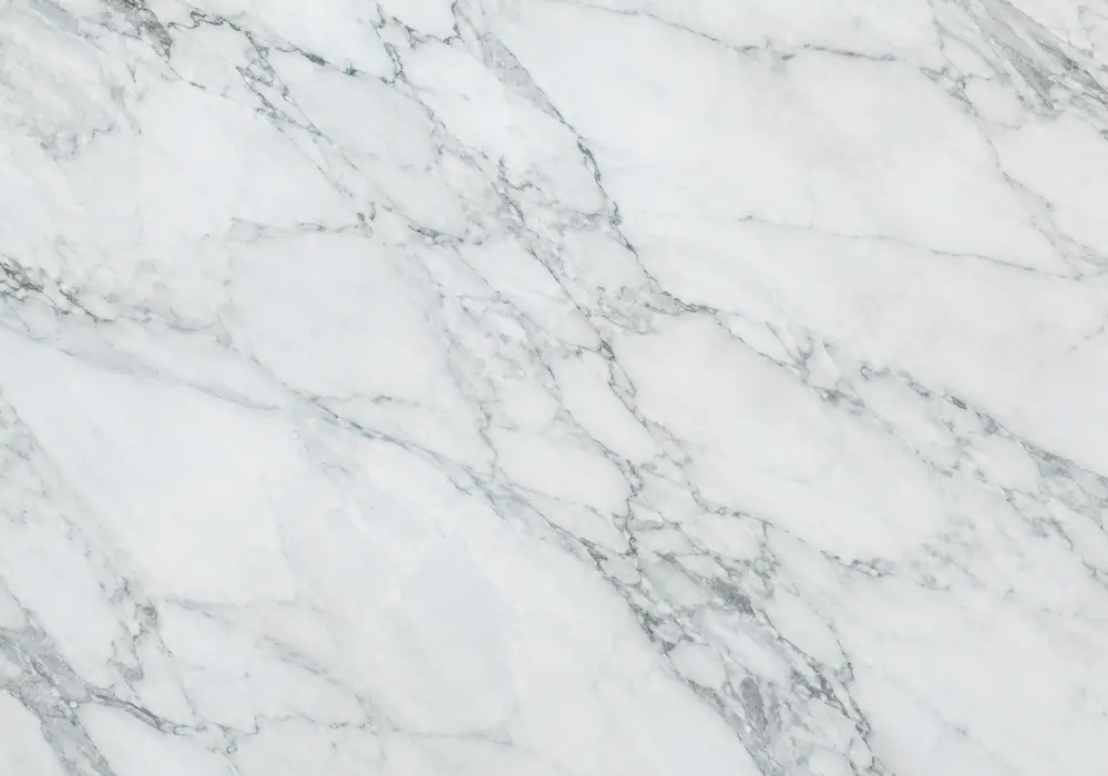 View sky blue marble slab with pastel blue-grey depth, white crystalline streaks, diffuse clouds and restrained golden veins.