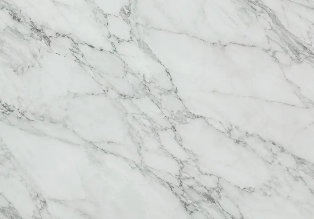 Spider Green wall panels with continuous white and pale-green web veining across aligned polished stone joints